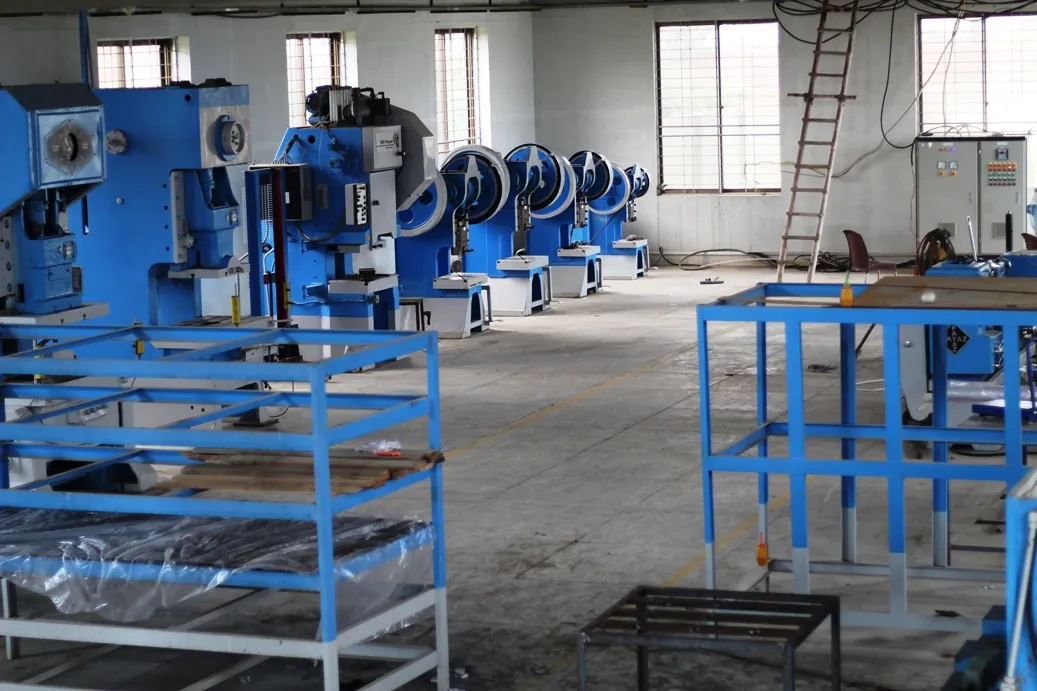 Production floor with presses and material racks at Stellar MPM